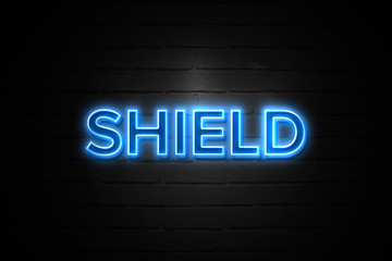 Obraz premium Shield neon Sign on brickwall