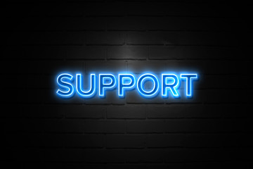 Obraz premium Support neon Sign on brickwall