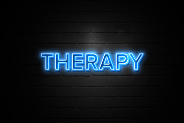 Fototapeta na wymiar Therapy neon Sign on brickwall