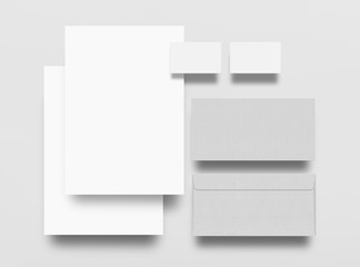 Mock up. Set of mock up elements on gray background. Blank objects for placing your design. Sheets of paper, envelope and business card.