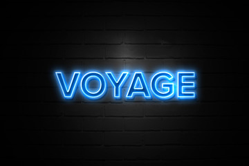 Voyage neon Sign on brickwall
