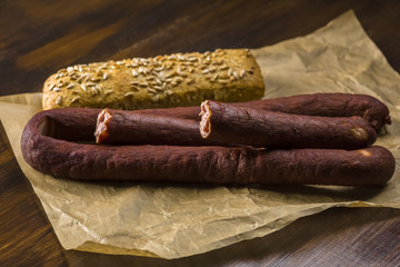 Takeaway sausage - packed in gray paper still tastes great