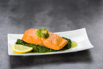 salmon on spinach