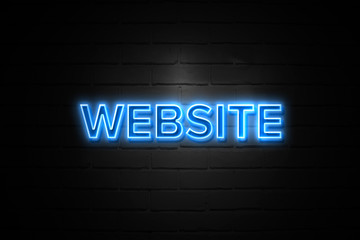 Website neon Sign on brickwall