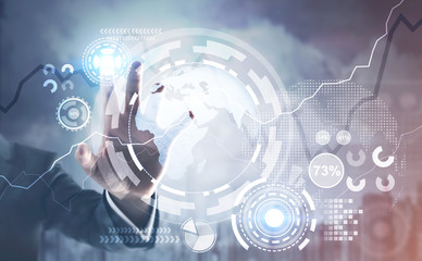 Businessman hand, HUD interface, city