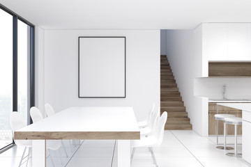 White kitchen interior with a poster