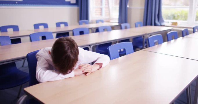 4k, Naughty young student smiling at camera during detention.