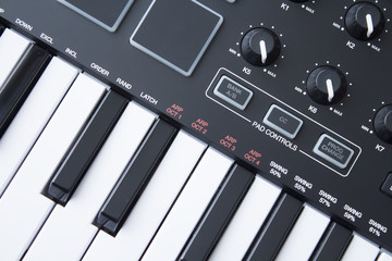Keys, pads and knobs of a MIDI keyboard