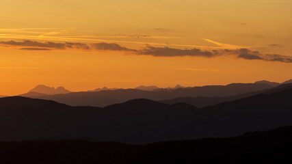 layers of mountains at golden hour