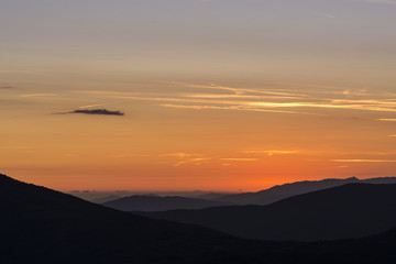 layers of mountains at golden hour