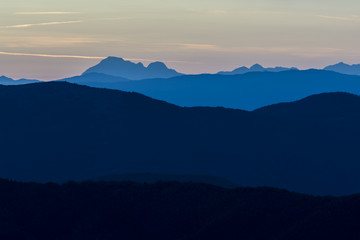 layers of mountains at blue hour © photonik87