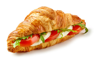 croissant sandwich with mozzarella and tomato
