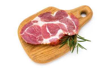 Fresh pig crude meat with rosemary.