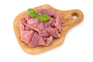 Raw chopped beef meat pieces isolated om white background cut out.