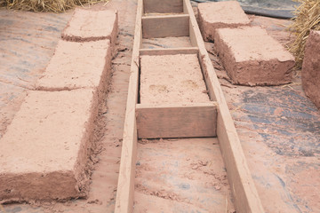 Hand made bricks with clay. Prepare mud for make bricks.
