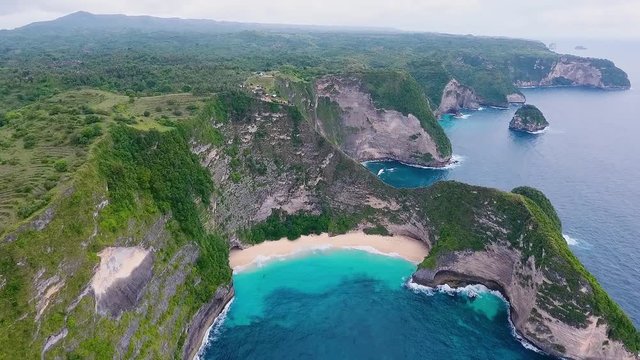 Aerial shot of the tropical coast Kelingking on island Nusa Penida, Indonesia