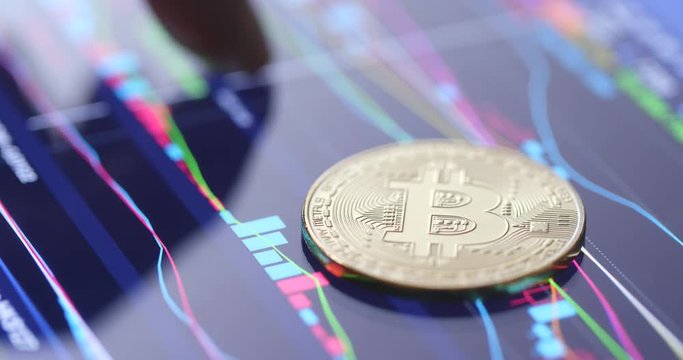 Bitcoin on stock market display screen