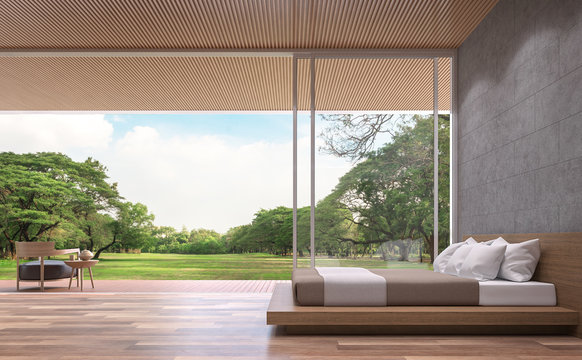 Modern contemporary bedroom 3d rendering image.The Rooms have wooden floors,concrete tile wall and wood lattice ceiling.furnished with wood furniture.There are open doors overlooks to big garden.