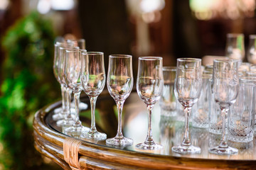 Beautiful table setting, with glasses and utensils.