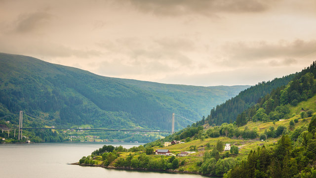 Osteroy suspension bridge in Norway, only road connection island with the mainland east area of Bergen