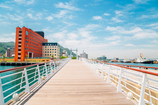 Blue wing moji bridge and sea in Mojiko retro town, Japan