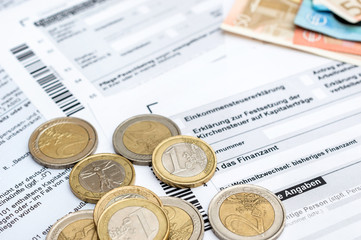 Obraz premium Money on the German tax form.