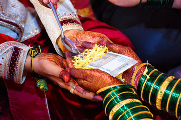 Bride and groom at Haldi ceremony a couple days before a Hindu wedding