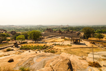 Fototapeta na wymiar View from the hill to the Sasivekalu Ganesha and Prasanna Narasimha. Ancient ruins of Vijayanagara