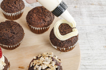 Chocolate muffins with oatmeal flakes.