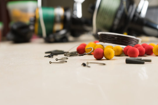 Baits, hooks, sinkers, reels, is preparing for carp fishing. Copy paste