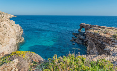 Fototapeta na wymiar Natural Arch in Ras Hamrija along the Southern Coast of Malta