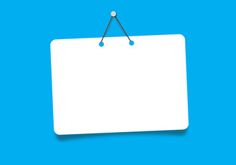 white sign hanging on blue  background