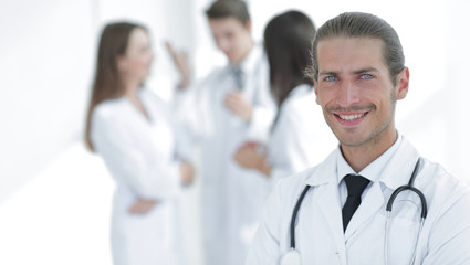 Fototapeta premium smiling doctor therapist on blurred background.