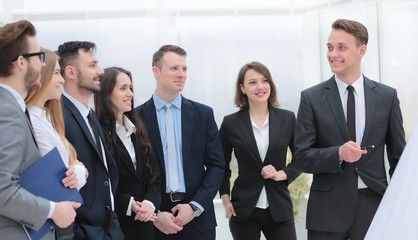 businessman pointing pen on blank Board for presentation