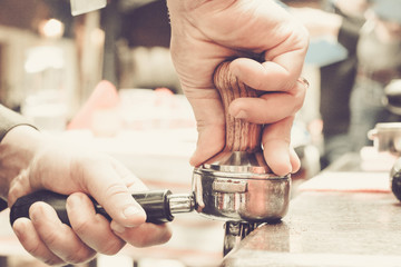 Coffee Preparation by Barista in the Cafe