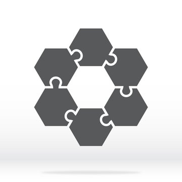 Simple icon hexagonal puzzles in gray. Simple icon puzzle of the six elements. Flat design. Vector illustration EPS10.