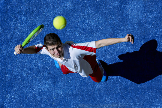 Aerial view of a young man playing paddle