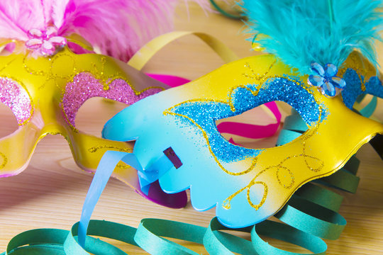 colored masks with streamers, party concept