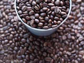 Black coffee seeds in zinc bucket