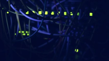 Operating equipment in the data center. Server room in the dark. Video in a low key. Without noise and artifacts. IT concept. Warning: the video with quality sound. - Powered by Adobe