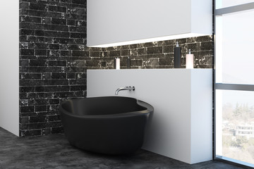 Bathtub in contemporary interior with city view