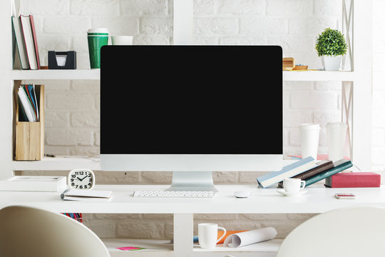 Modern desktop with blank computer