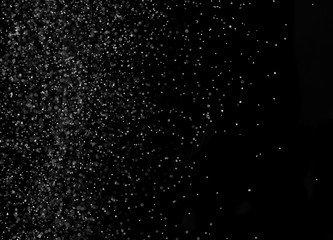 The texture of the snow on a black background