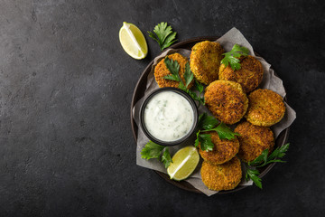 roasted chickpeas falafel patties with garlic yogurt sauce
