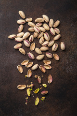 roasted and salted pistachios on brown bowl