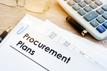 Pile of documents with title Procurement Plans.