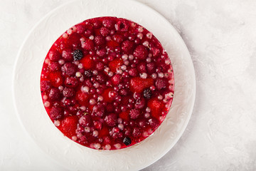 delicious no baked cheesecake with jelly and summer berries