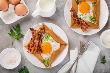crepe with fried egg and bacon for breakfast