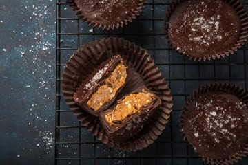 chocolate cups with salted caramel and nuts