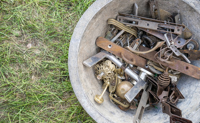 metal bowl with different door fittings / Metal bowl with different door fittings on a flea market